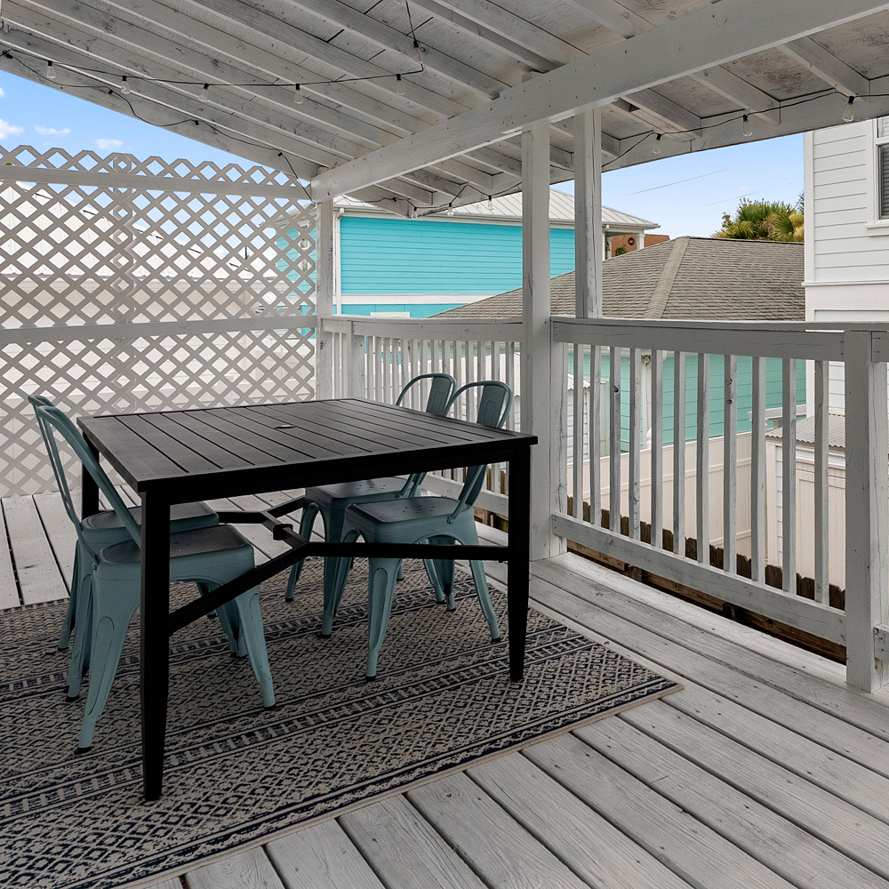 Shaded patio at The Beach Break vacation rental